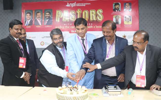 NPF key leaders cutting a cake in honor of Pastors Appreciation Day